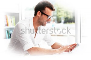 stock-photo-male-student-browsing-the-web-on-his-tablet-178462139 copie