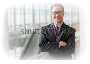 stock-photo-portrait-of-a-handsome-ceo-smiling-251320138 copie